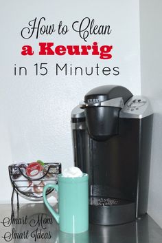 a coffee maker sitting on top of a counter next to a cup with whipped cream in it