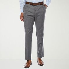 For an effortlessly tailored look, pair these men's suit pants from Van Heusen with a t-shirt and denim jacket. Made from a woven stretch-blend with the brand's Cool Flex technology to keep you comfortable, this dress pant is cut for a slim-fit. And they are complete with a hook-and-eye with a zip closure, belt loops, and side and back pockets.Front Style: Flat FrontFeatures: Stretch FabricClosure Type: ButtonFit: Slim FitPockets: 2 Back Button Pockets, 2 Side Slip PocketsRise: Mid RiseFiber Content: 68% Polyester, 29% Rayon, 3% SpandexFabric Description: WovenLining: UnlinedInseam: 32 In, 30 In, 29 InLeg Style: Slim LegCare: Dry Clean OnlyMaterial: Polyester BlendCountry of Origin: Imported Slim Fit Suits With Trousers For Business Casual, Classic Slim Fit Pants For Office Wear, Tailored Professional Pants For Business Casual, Professional Business Casual Pants With Welt Pockets, Classic Business Pants For Spring, Classic Office Wear Pants In Suiting Fabric, Fitted Work Pants For Spring Business Wear, Classic Spring Business Pants, Tailored Suits With Straight Leg For Office