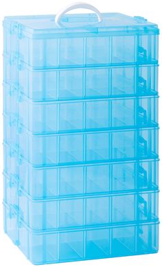 a blue plastic storage box filled with lots of clear drawers on top of each other