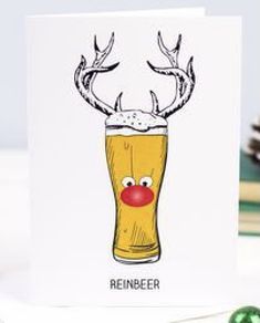 a christmas card with a reindeer's head in a beer glass and the words reindeer on it