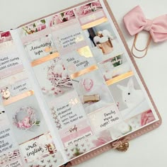 an open planner with pink and gold decorations