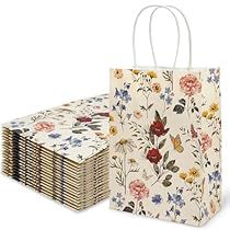 a bunch of paper bags with flowers on them