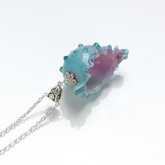 This Teal seashell necklace are made of glass in lampwork technique. It can be a bright addition to your outfit or a great gift for those who love the ocean! 👉 This item is made by hand, so the size, shape and color are different every time I make it. Please choose a necklace that you like from the available ones. Dimensions: pendant height about 2 inch (50mm), see last photo for exact dimensions. Silver colored metal chain with adjustable length, 16-20 inches (40-50cm). Materials: artist lampw Turquoise Shell-shaped Necklace For Gift, Turquoise Shell Necklace For Gift, Unique Glass Necklace For Beach, Unique Glass Necklace For The Beach, Unique Glass Necklaces For The Beach, Blue Ocean-inspired Shell As Gift, Blue Ocean-inspired Shell As A Gift, Ocean-inspired Glass Necklaces For Gifts, Blue Shell Necklace As A Gift