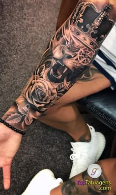 a man with a tattoo on his arm