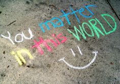 some writing on the ground that says you matter