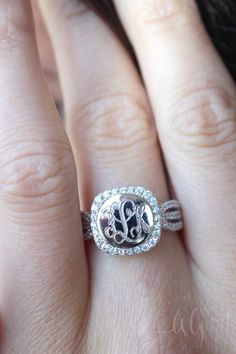 Would you look at that shine! Our Sterling Silver CZ Monogram Ali Ring has all the WOW factors! Features CZ stones all along the face and halfway along the triple split band! This ring is available in sizes 5-10. Use the drop down to select your size. The monogram face measures approximately 10.45 mm. Personalize this ring today! Initials will be in the order of First, Last, Middle. For instance if your name is Kelly Marie Brown, your initials will be engraved in the order KBM. Please select you Silver Initial Ring, Silver Monogram, Sterling Silver Initial, Monogram Ring, Monogram Jewelry, Initial Ring, Personalized Rings, Monogram Gifts, Cz Stone