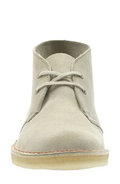 Inspired by the footwear worn by British officers in World War II, this iconic lace-up ankle boot is fashioned from soft suede and grounded by a natural crepe sole for flexible cushioning. 1" heel (size 8.5) 4" shaft Lace-up style Suede upper/leather lining/crepe sole Imported Women's Shoes Beige Lace-up Boots With Leather Sole, Beige Leather Sole Lace-up Boots, Casual Suede Lace-up Boots With Leather Sole, Beige High-top Suede Desert Boots, Beige Suede High-top Desert Boots, Beige Suede Casual Boots, Casual Beige Suede Boots, Classic Beige Desert Boots With Suede Lining, Beige Desert Boots With Stitched Sole And Round Toe