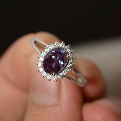 This is a gorgeous handmade creation. Its beauty is its simplicity & Elegance. The 6*8mm oval shape faceted lab alexandrite is crafted in solid sterling silver and with rhodium plated. All item is sent in a beautiful gift box You can realize more lovely stuff clicking the link https://www.etsy.com/shop/knightjewelry?refshopsection_shophome_leftnav Please leave the correct address and you phone number for delivering successfully. Alexandrite Ring Engagement, Oval Sapphire Engagement Ring, Emerald Engagement Ring Set, Pretty Engagement Rings, Christmas Gift For Family, Blue Topaz Engagement Ring, Sterling Silver Promise Rings, Alexandrite Engagement Ring, Ring Halo