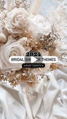 a bouquet of flowers sitting on top of a white cloth covered tablecloth with the words, bridalsher themes part twenty