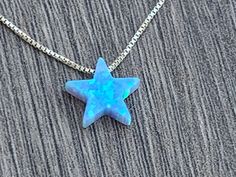 "Opal Star Charm Necklace ** Please measure your neck before ordering (standard size is 16-18) ** 13\" & 14\" chains can not be returned Necklace Details: Sterling Silver 0.7mm Box Chain 14kt Gold Filled 0.7mm Box Chain Charm Details - Lab Created OPAL Opal Star - 10mm x 2.5mm (Light Blue or White ) 100% satisfaction guaranteed . If for any reason you are not happy with this product you may ship it back. See other ideas: https://www.etsy.com/listing/462818642/opal-moon-and-star-sterling-silv Hallmarked Star Of David Jewelry For Gift, Sterling Silver Star Jewelry For Birthday, Symbolic Star-shaped Jewelry As Gift, Great Graduation Gifts, Star Charm Necklace, End Of The Year, Velvet Bag, Star Charms, Star Necklace