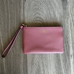 Brand New, Never Used, Pink Coach Wristlet. Care Instructions Card Included. Inside Is Made Up A Maroon Material, With Gold Hardware. Strap Wrist Is Not Detachable! Coach Emblem Is Written In Hold As Well! Coach Rectangular Wristlet With Zipper Pouch, Coach Wristlet Pouch For Daily Use, Daily Use Coach Wristlet Pouch, Daily Use Coach Pouch Wristlet, Coach Zipper Pouch Wristlet, Coach Wristlet With Zipper Pouch, Coach Zipper Wristlet, Coach Wristlet With Zipper Pouch For Daily Use, Pink Coach Wristlet