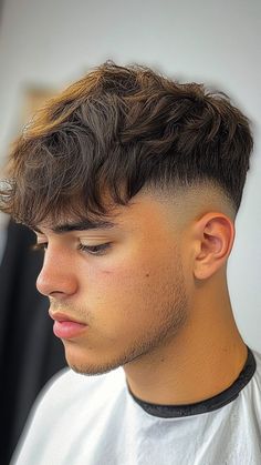 The French Crop Undercut features a bold contrast between a cropped top and shaved sides, creating a striking, modern look. This edgy style is perfect for those who want to make a statement while keeping their hair low-maintenance. Click the pin for more inspiration and follow us for the latest trends! #MensHair #FrenchCrop #Undercut #HaircutIdeas #MensStyle French Crop, Crop Haircut, Textured Bangs, The Quiff, Beard Fade, Clean Shave, Long Beards, Bald Fade, Hair Tattoos