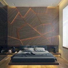 a modern bedroom with wood paneling on the wall and bed in the middle,