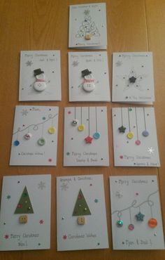 twelve christmas cards with buttons on them