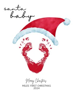 santa baby's handprints on the bottom of a christmas card with red and white hat