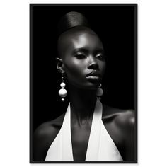 a black and white photo of a woman with earrings on her head, in front of a dark background