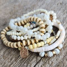 Seven stretch bracelets White Stacked Bohemian Beaded Bracelets, White Bohemian Stacked Bracelets, Bohemian White Stacked Bracelets, Adjustable Beige Stretch Bracelet, White Beaded Stretch Bracelets, Stretch Beaded Bracelets Diy, Howlite Necklace, Crescent Earrings, Crescent Necklace