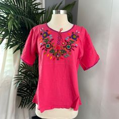 Unique Tops No Body Is Having The Same Top Is Hand Made Embroidery In Guatemala 100% Cotton Organic Everything Comes From Nature. Tag Said Large But In Guatemala The Sizing Is Different If It Said Large Is One Size Less Medium And You Can See The Measurements In The Pictures. Thank You For Visiting My Closet And Sharing!! Pink Casual Embroidered Top With Short Sleeves, Casual Pink Embroidered Top With Short Sleeves, Casual Pink Short Sleeve Embroidered Top, Traditional Pink Embroidered Top, Pink Bohemian Embroidered Top For Vacation, Bohemian Pink Embroidered Top For Vacation, Pink Short Sleeve Embroidered Cotton Top, Casual Pink Embroidered Top For Beach, Casual Pink Embroidered Top For Vacation