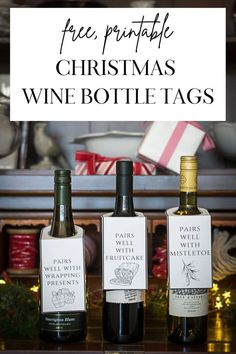 three bottles of wine with the words free printable christmas wine bottle tags on them