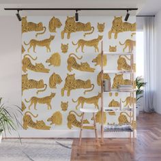 a wallpaper with tigers and lions on it in gold, against a white background