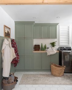 the kitchen is clean and ready to be used as a mudroom or laundry room