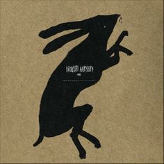 the silhouette of a frog is shown on a brown paper bag with black lettering that reads,