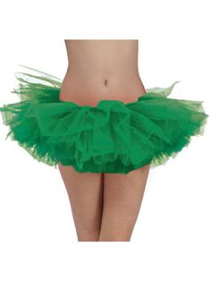 a woman wearing a green tutu skirt