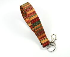 This cute lanyard has beautiful brown lines. It is perfect for any occasion.You can leave me a convoy if you need a different size.You can have a wardrobe of lanyard to match your outfit. This lanyard is made of soft 100% cotton fabric to give a comfortable feel around your neck. This lanyard is easy to take care. You can spot clean and throw in a washer and hang dry. If you want you can iron and it is ready to use. These lanyards are perfect if you have metal allergy. Each of these lanyards wil Adjustable Brown Lanyard As Gift, Cute Lanyard, Cute Lanyards, Fabric Lanyard, Brown Line, 2024 Christmas, Have Metal, Crochet Keychain, Brown Fabric