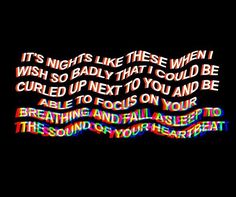 the words are written in multicolored letters on a black background, and there is no image here to provide a caption for