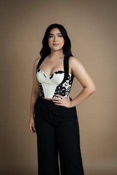 Based in: México Designed to accentuate your silhouette, this bustier features cups, adjustable straps, and internal boning for structure and support, ensuring both comfort and style. You'll immediately notice the meticulous hand-embroidery adorning it, a labor of love by artisan Teresa Pérez from the vibrant community of Zinacantán. Using traditional backstrap loom techniques, each flower and motif is carefully drawn and embroidered with the fill stitch technique, showcasing the artistry and sk Frayed Dress, Embroidered Bustier, Mexican Top, Mexican Folklore, Mexico Design, Backstrap Loom, Mexican Outfit, Art And Fashion, Indigenous Community