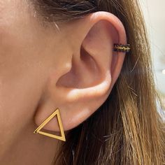 Triangle Stud earrings! ▸Handmade of Sterling Silver 925 that is 24k DOUBLE Gold filled High-quality gold finish that is made to last for a long time 😌 >> Handcrafted with love for you in Greece! Suitable for women of all ages! SIZE The diameter of the triangle is 0.55 inches - 1,4 cm. All Artiby jewelry comes in beautiful packaging, gift-ready. >>IS IT A GIFT? If you wish to send a personal message, please name it at the checkout process! ------------------------------------------- Modern Single Ear Cuff As Gift, Minimalist Triangle Hoop Earrings As Gift, Modern Ear Cuff For Pierced Ears As A Gift, Minimalist Triangle Jewelry For Pierced Ears, Modern Ear Cuff For Gift, Modern Ear Cuff As A Gift, Modern Cartilage Earrings With Ear Wire As Gift, Modern Handmade Ear Cuff For Gifts, Everyday Single Geometric Earring