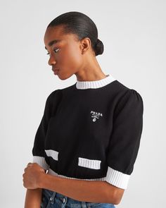 Find PRADA Cotton Crew-neck Sweater on Editorialist. Plain stitch knit Cropped fit Ribbed knit collar Saddle shoulder Short sleeves Ribbed knit sleeve trim and hem Embroidered logo Prada Sweater, Knit Sleeve, Black White Fashion, White Cotton, Black Sweaters, Crew Neck Sweater, Contrasting Colors, Classy Outfits, Ribbed Knit