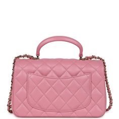 This mini rectangular flap bag is in Dark Pink lambskin with light gold tone hardware and has a front flap with signature CC turnlock closure, rear half moon pocket, top handle and single interwoven Dark Pink leather and light gold tone chain link shoulder/crossbody strap.The interior is lined in Dark Pink leather and features a zipper pocket with Chanel pull and an open pocket below.Collection: 23AOrigin: ItalyCondition: New and never worn (plastic on hardware)Accompanied by: Chanel box, Chanel Chanel Mini Rectangular, Chanel Box, Chanel Mini, Pocket Top, Sierra Leone, Flap Bag, Pink Leather, Lambskin Leather, Half Moon