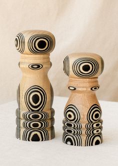 A short and tall pepper grinder in light wood with psychadelic black circle pattern. Cute Salt And Pepper Grinders, Pepper Grinder Tattoo, Clean Origin, Salt And Pepper Grinders, Spice Grinder, Interiors Dream, Pepper Mill, Cute House, Fun Gifts