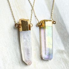 "Listing is for one Angel Aura crystal quartz Point Pendant Connector Stone Size: approx. 13-15mm x 47-55mm Can choose just pendant or pendant with chain necklace Drill Hole: drilled STOCK PHOTOS-- Pendants will vary slightly as to the shape and size of crystal Quartz, making each ring unique. Quartz is a power stone. It has been called the \"Universal Crystal\" because of its many uses. It enhances energy by absorbing, storing, amplifying, balancing, focusing and transmitting." Iridescent Gemstone Pendant Crystal Necklace, Iridescent Pendant Crystal Necklace For Healing, Iridescent Crystal Gemstone Necklaces For Spiritual Use, Spiritual Iridescent Crystal Necklace With Gemstone, Iridescent Spiritual Gemstone Crystal Necklace, Iridescent Gemstone Crystal Necklace For Spiritual Use, Gold Spiritual Crystal Necklace, Gold Mineral Crystal Necklace For Gift, Gold Quartz Crystal Necklaces For Jewelry Making