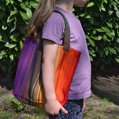 Child sized tote bag is ready to fill with things for the beach, the drive to the zoo, or the farmer's market with mom. Handwoven 100% cotton in bright rainbow multicolor stripes in all the colors of the rainbow! 9" High x 7.5" Wide x 3.5" deep with 2 straps that have a 5.5" drop. Washable and dryable! Rainbow Bags For Everyday Summer Use, Rainbow Everyday Bags For Summer, Multicolor Cotton Beach Bag For Everyday, Multicolor Cotton Beach Bag, Everyday Multicolor Cotton Beach Bag, Multicolor Cotton Everyday Beach Bag, Multicolor Everyday Beach Bag, Eco-friendly Multicolor Cotton Beach Bag, Cotton Multicolor Beach Bag