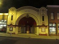 an old building is lit up at night