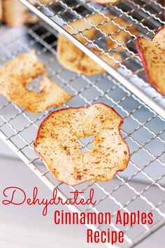 baked cinnamon apples on a cooling rack with the words, dehydrated cinnamon apples recipe