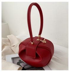 Color: Red Trendy Red Shoulder Bag With Large Capacity, Trendy Red Bag With Large Capacity, Trendy Large Capacity Red Bag, Trendy Red Crossbody Bag, Trendy Red Bucket Bag For Daily Use, Chic Red Handheld Bucket Bag, Trendy Red Bucket Bag With Large Capacity, Red Large Capacity Box Bag For Travel, Red Crossbody Box Bag With Top Carry Handle