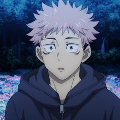 an anime character with pink hair and blue eyes staring at something in front of him