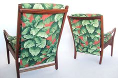 two green and red chairs sitting next to each other