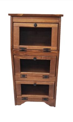 a wooden cabinet with two drawers on top