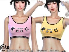 two women in sports bras with video game controllers on their chestes and arms