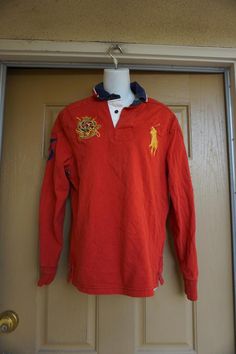 Vintage  Polo Ralph Lauren men's red shirt with embroidered crest. Size labeled small. In good vintage condition measurements taken across front lying flat21" armpit to armpit20" across front of waist 24" length Uniform Outfits, Embroidered Robes, School Uniform Outfits, India Dress, Badass Aesthetic, Mens Sweater, Tent Dress, Vintage Polo Ralph Lauren, Vintage Polo