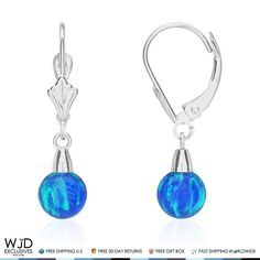 14K Solid White Gold 6 mm Ball Shaped Blue Fire Opal Leverback Dangle Earrings 14K Solid White Gold 6 mm Ball Shaped Blue Fire Opal Leverback Dangle EarringsThese simple yet elegant dangle drop earrings are crafted with 6 mm ball shaped deep blue fire opal gemstones fashioned in 14K solid white gold and safely secured with comfortable lever back closure. Product Specifics Metal 14k White Gold Finish High Polished Earring Type Dangle (Drop) Gem Fire Opal Main Stone Shape Round Main Stone Creation Synthetic Main Stone Width 6 mm Fastening Leverback Stamp 14K Height 25 mm (1 inch) SKU 6156 Retail Price $90.00 Stock#: LW117-3-6-1343600 Free 30 Day Returns All WJD Exclusives items come with a 30-days return and money-back guarantee. Must be in original condition and with the original tag on. In Blue Drop Earrings With Lever Back, Blue Fire Opal, Kids Earrings, Leverback Earrings, Blue Fire, Toe Rings, Pretty Jewellery, Opal Gemstone, Bridal Rings