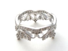 Simulated Diamond Jewelry - This is a sterling silver stylized crown ring with clear cubic zirconias. The crown design encircles the ring, it is a size 7, width is .38", weight is 4.2 grams and hallmarked 925. Crown Design, Crown Ring, The Ring, Ring Size 7, The Crown, Diamond Jewelry, Ring Size, Size 7, Crown