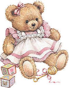 a brown teddy bear wearing a white dress and holding a pink bow sitting next to a box