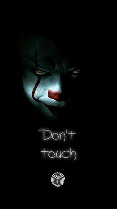 a creepy clown with the words don't touch in white lettering on a black background