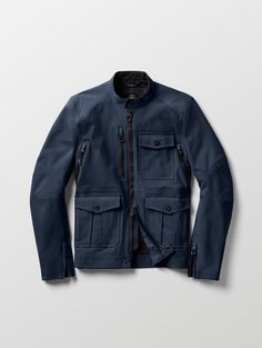 a dark blue jacket with zippers and pockets