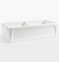 a white sink sitting on top of a counter